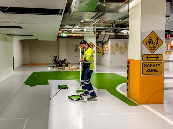 Garry applying floor colour bankstown